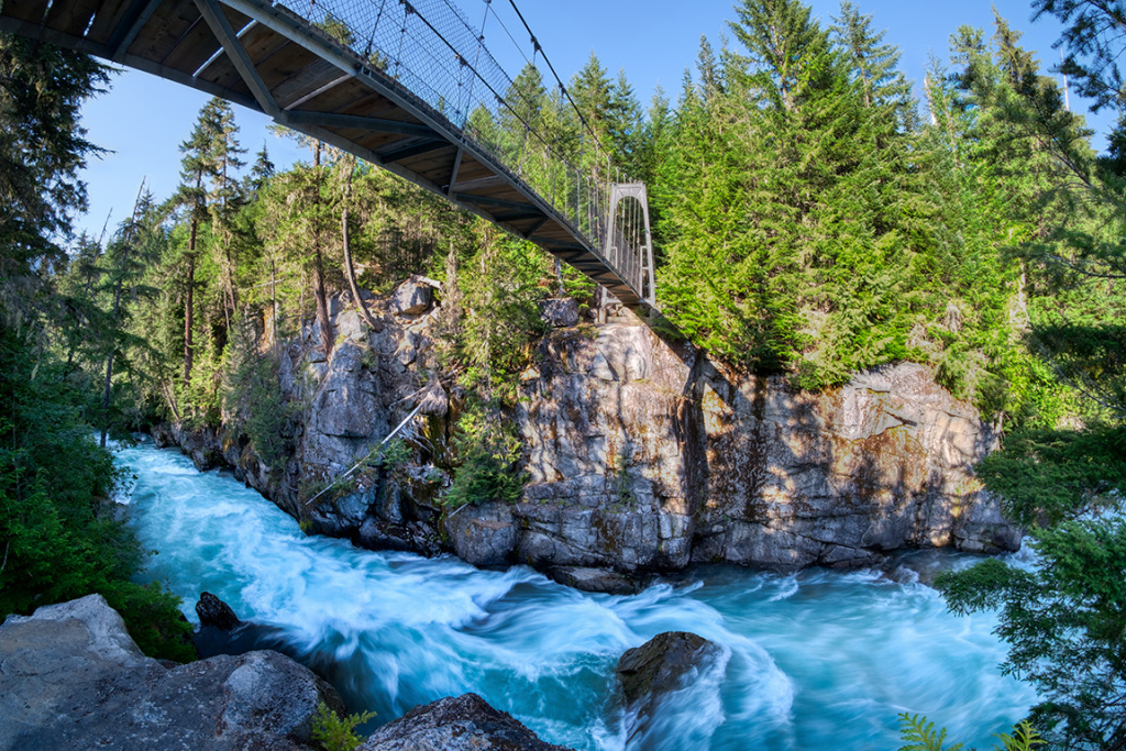 ariverrunsthroughitmaclaurinscrossingsuspensionbridgecheakamus